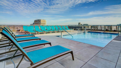 View of pool on rooftop of The Grand apartment building.
